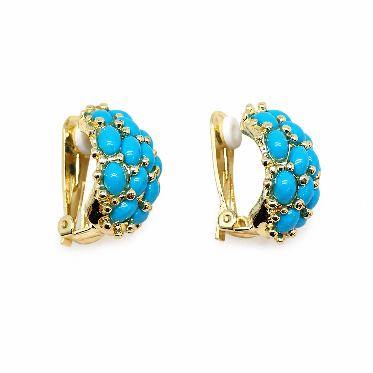 Gold clip-on earrings clustered with turquoise-blue cabochons.