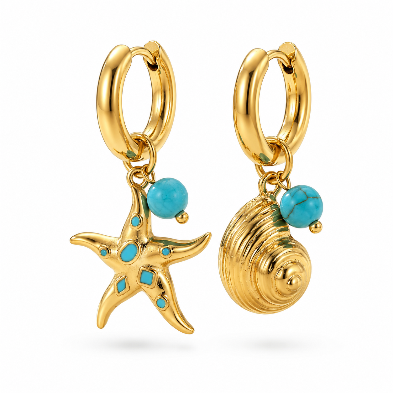 Gold dangle earrings — one starfish with a blue bead, one nautilus shell.