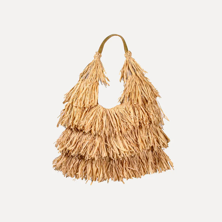 Natural raffia fringe shoulder bag with a bronze leather handle.