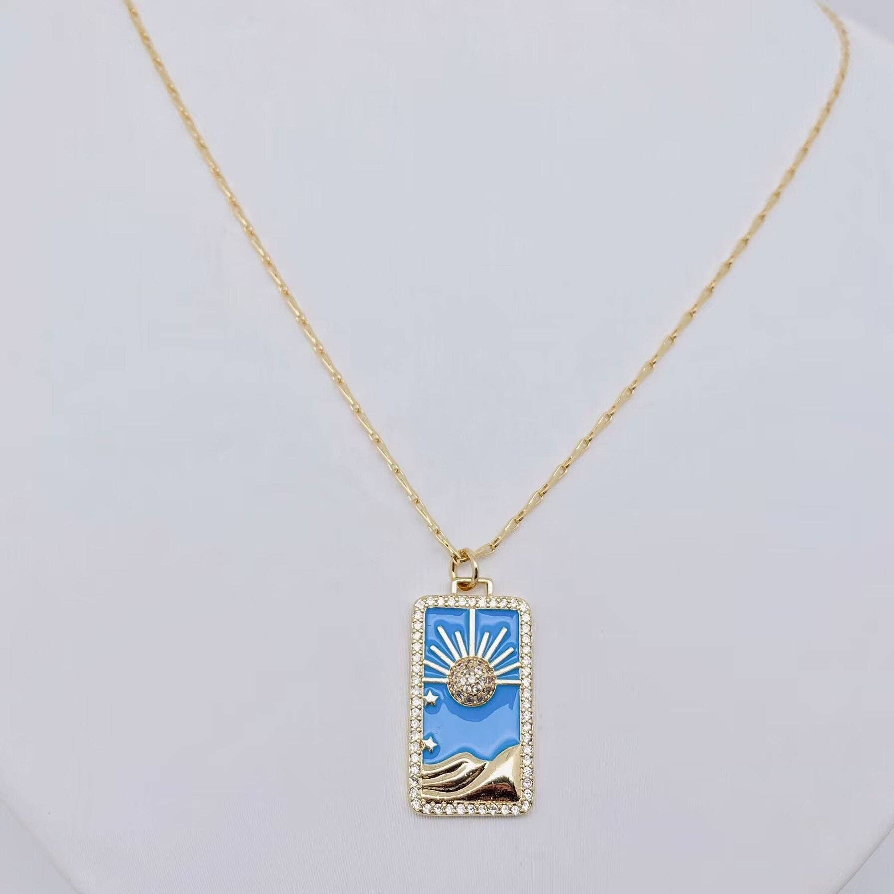 Minimalist evil eye necklace in gold-plated stainless steel with CZ inlay.