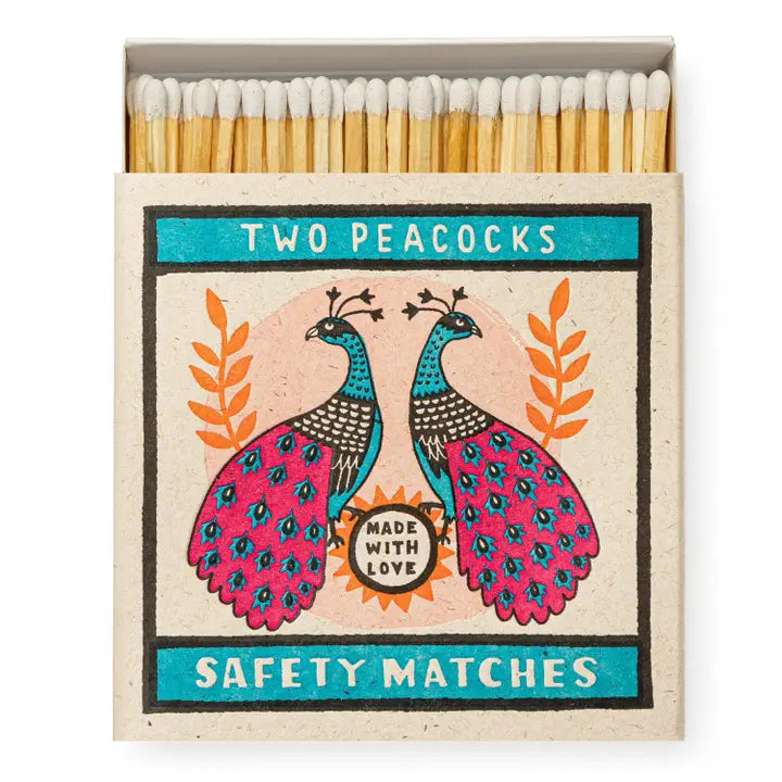 Matches box with peacock design and 'Two Peacocks' branding