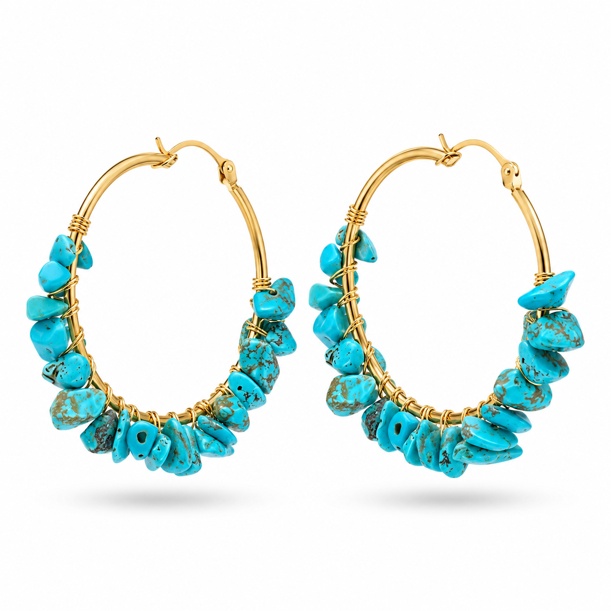 Gold hoop earrings with turquoise stones on a white background
