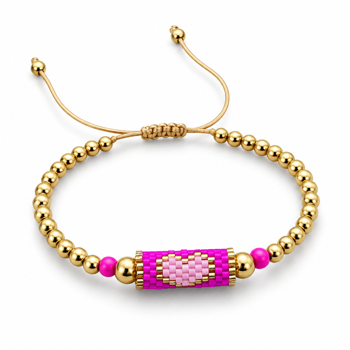 Pink: Gold seed-bead bracelet with a woven pink heart motif on an adjustable cord
