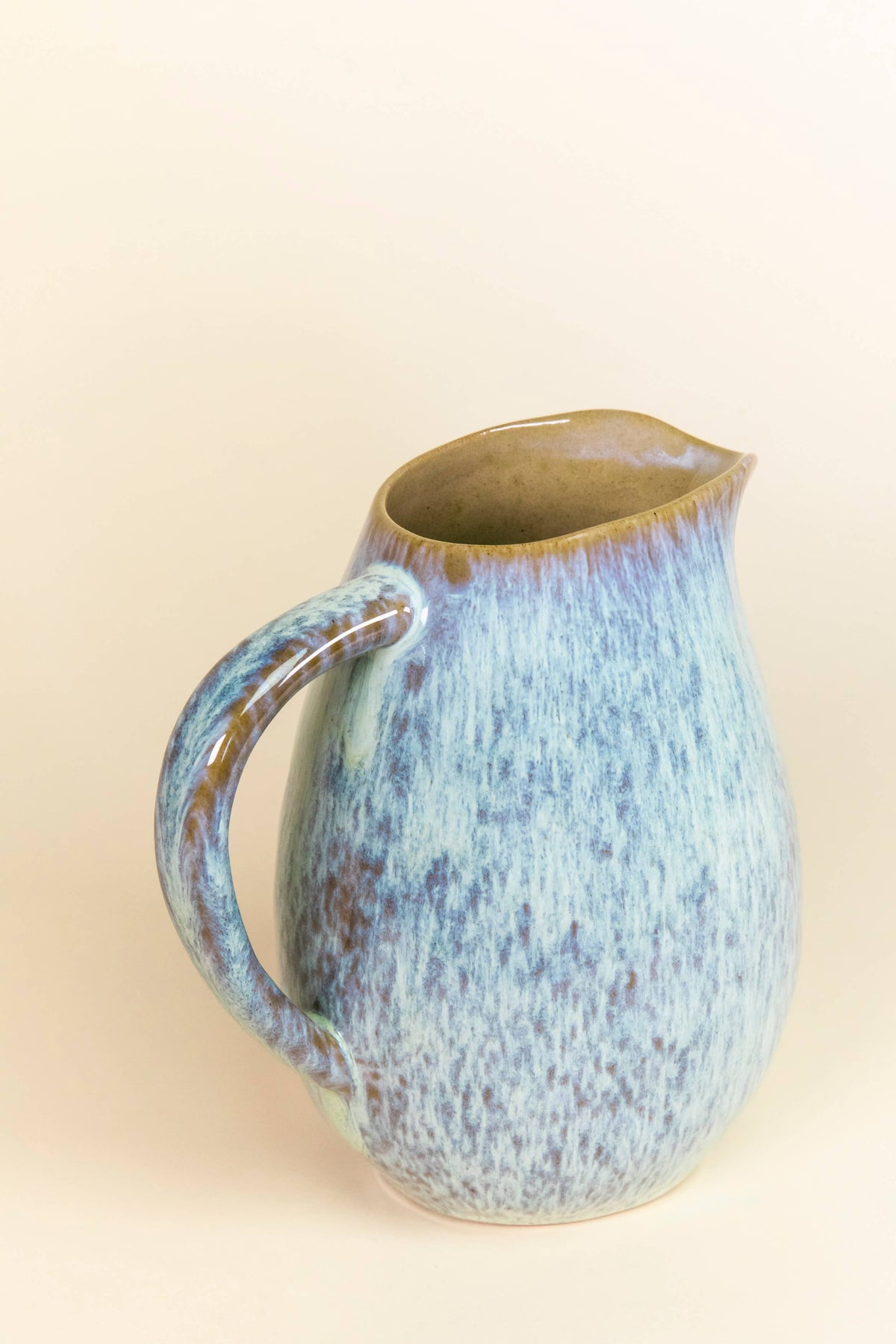 Tejo pitcher, side profile showing hand-glazed finish