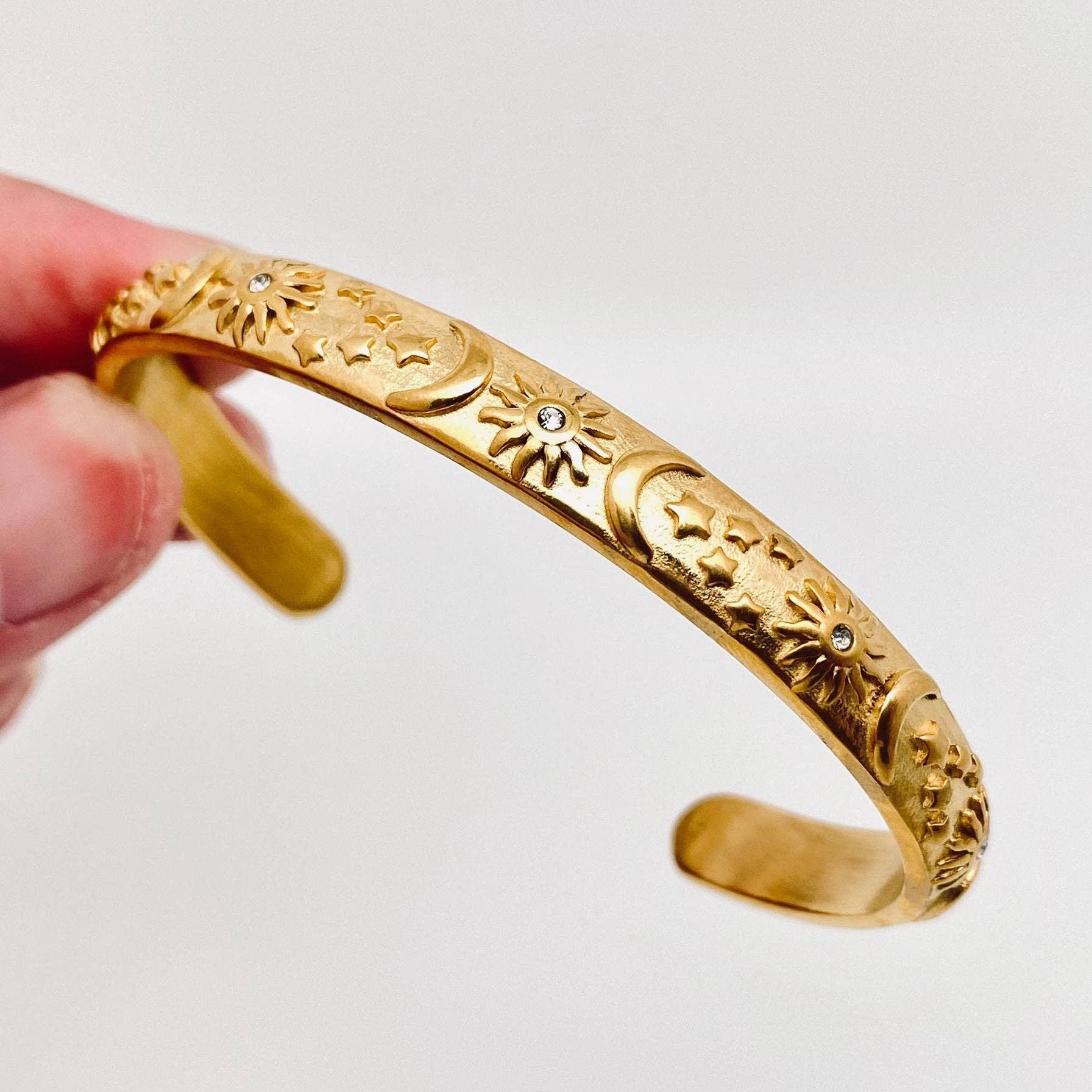 Gold plated tarot cuff bangle with celestial engraving