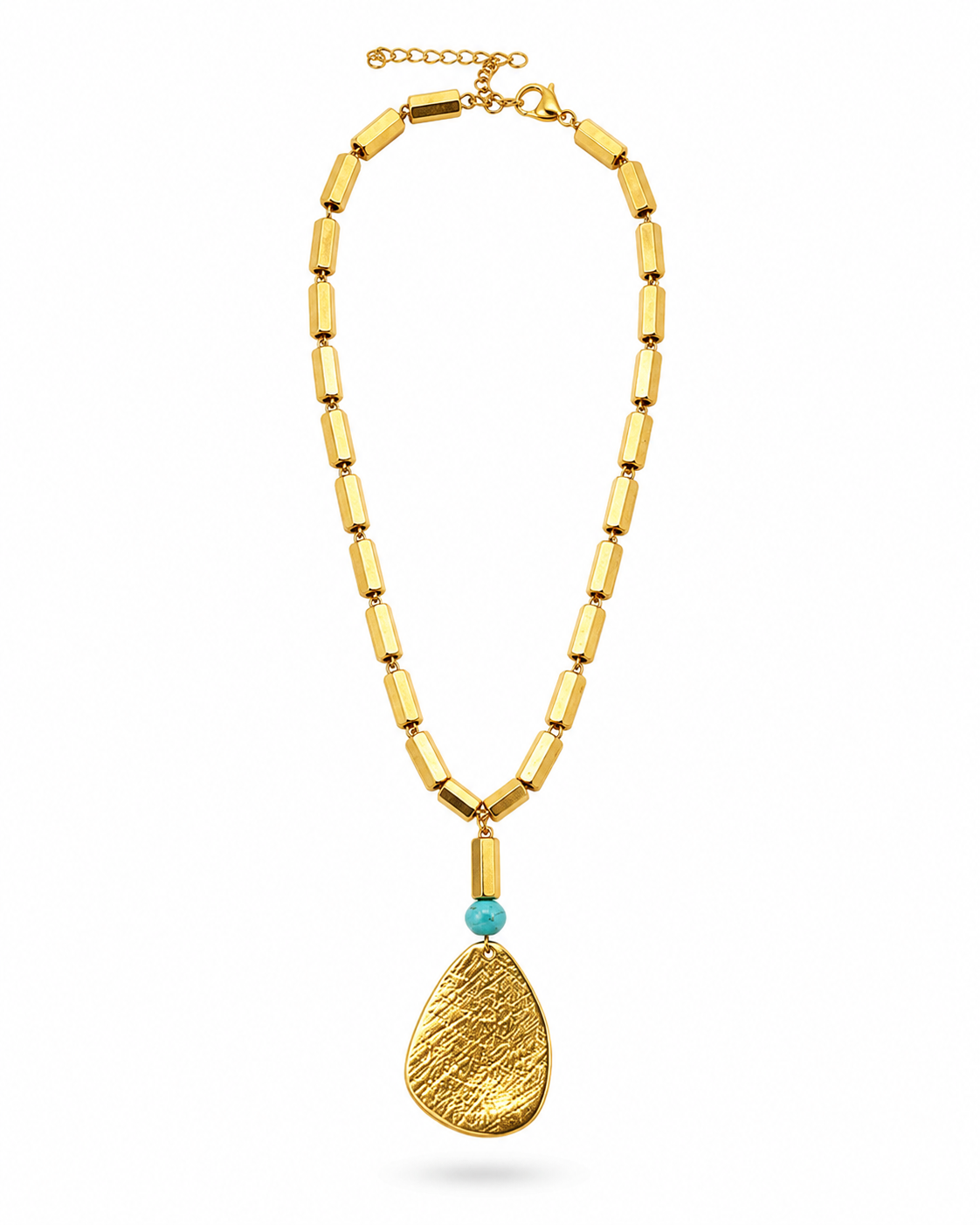 A gold-toned necklace featuring a textured teardrop pendant, a small turquoise blue bead, and a chain made of elongated cylindrical links, shown against a plain white background.