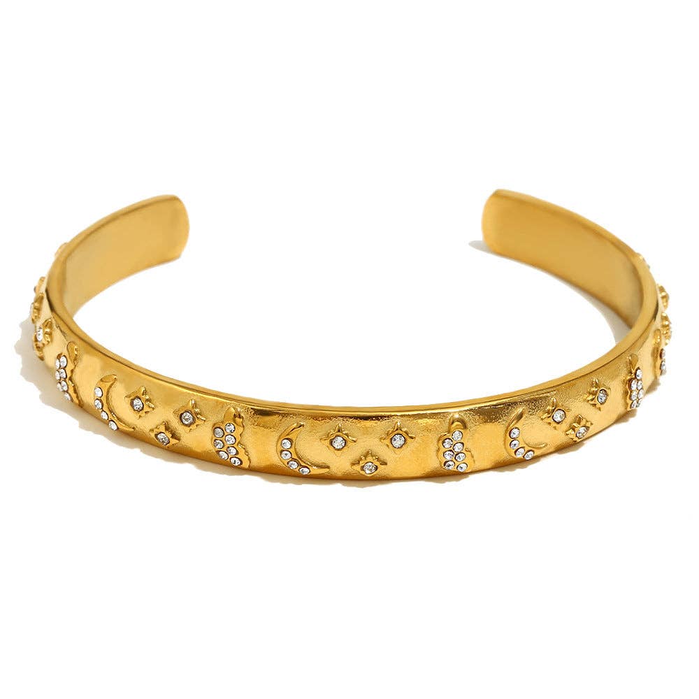 Engraved gold moon cuff bangle with celestial detailing