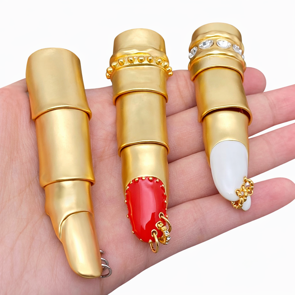 Avant-garde red and gold statement ring with architectural sculptural silhouette.