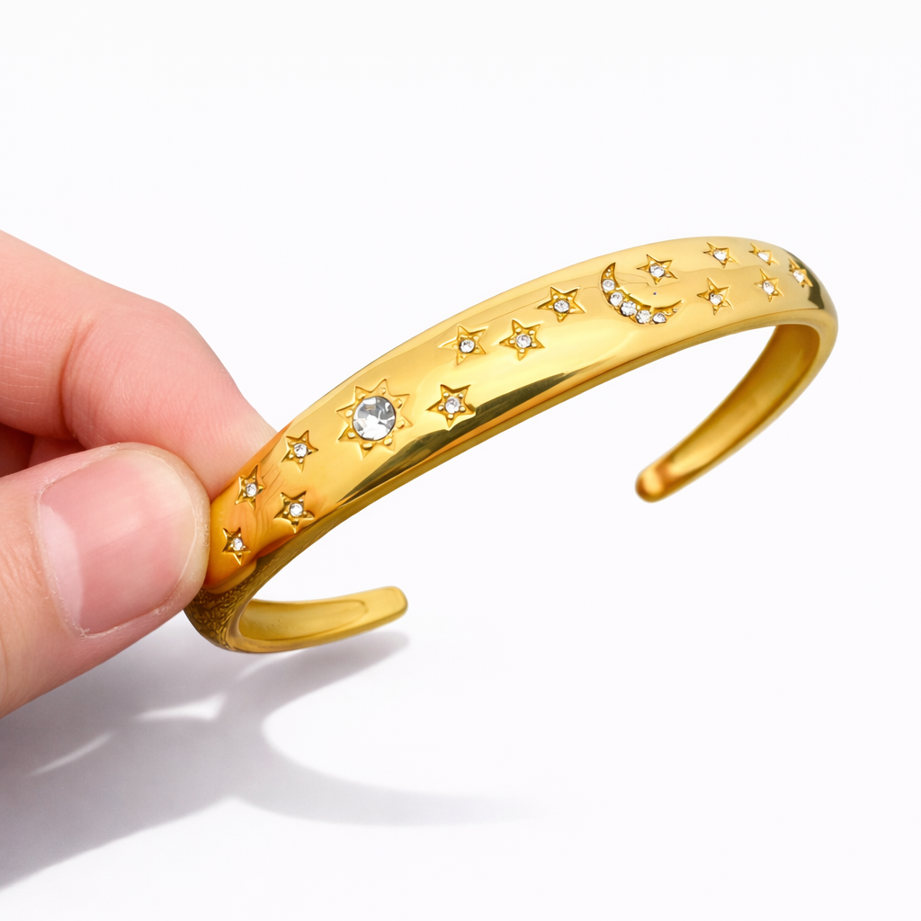 Gold plated moon and star cuff bracelet with cubic zirconia details