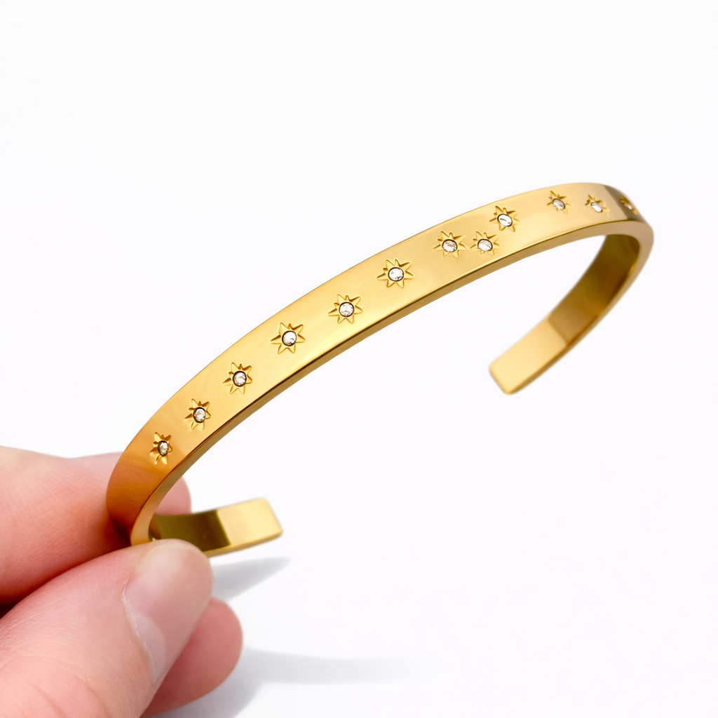 Gold plated star cuff bracelet with cubic zirconia details