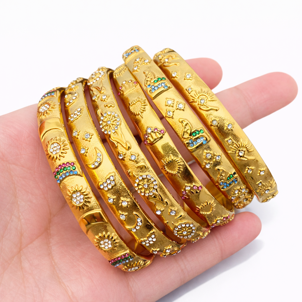Engraved gold moon cuff bangle with celestial detailing