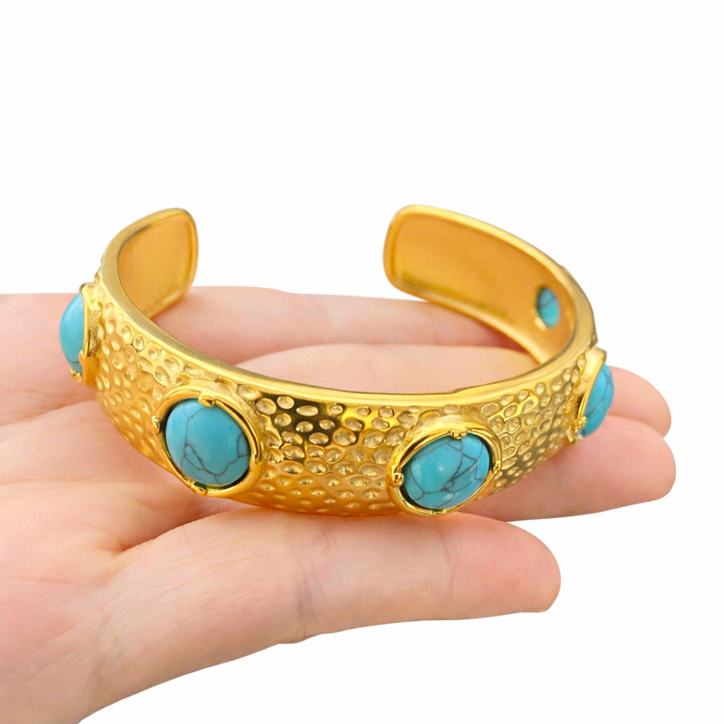 Sculptural gold cuff bangle with turquoise detailing in 18K gold plating