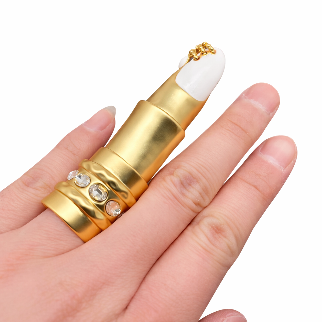 White sculptural statement ring in 24K gold plating worn across finger