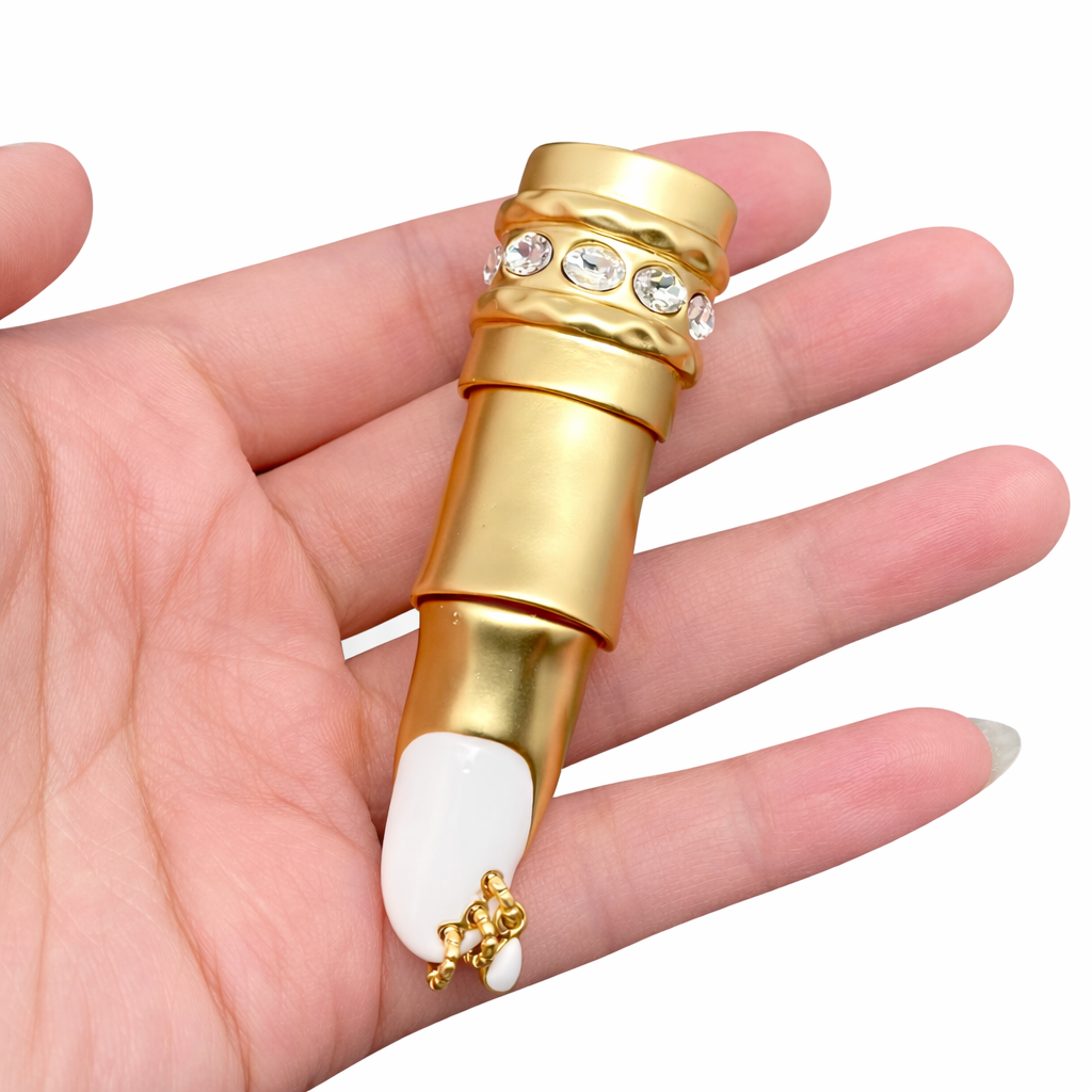 24K gold-plated sculptural statement ring with white detailing